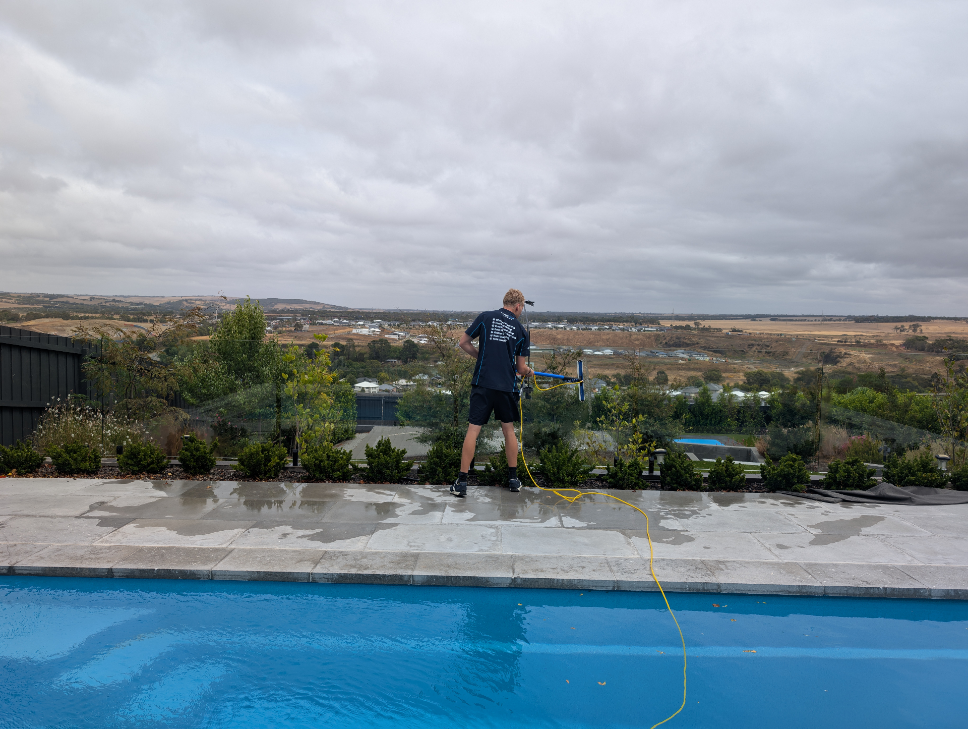 TwinTide Cleaning crew pressure washing a driveway in Geelong